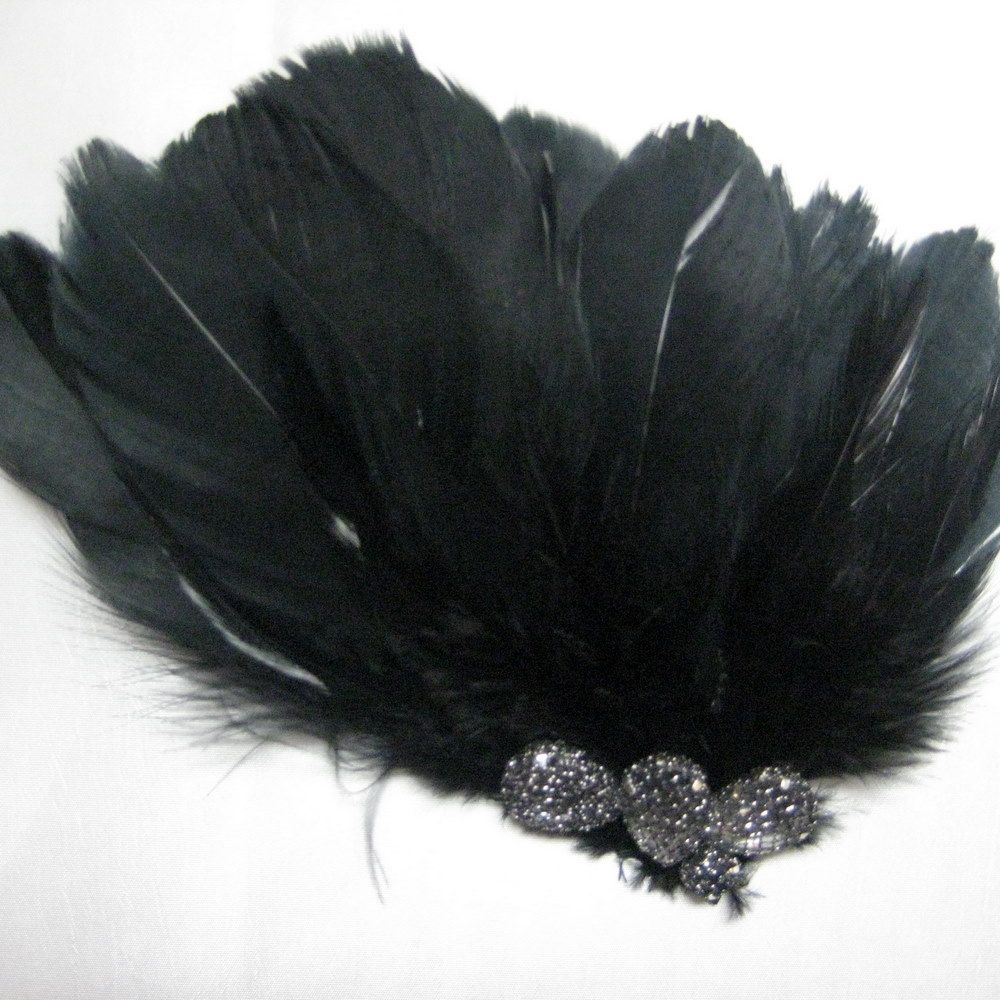 FEATHER BROOCH