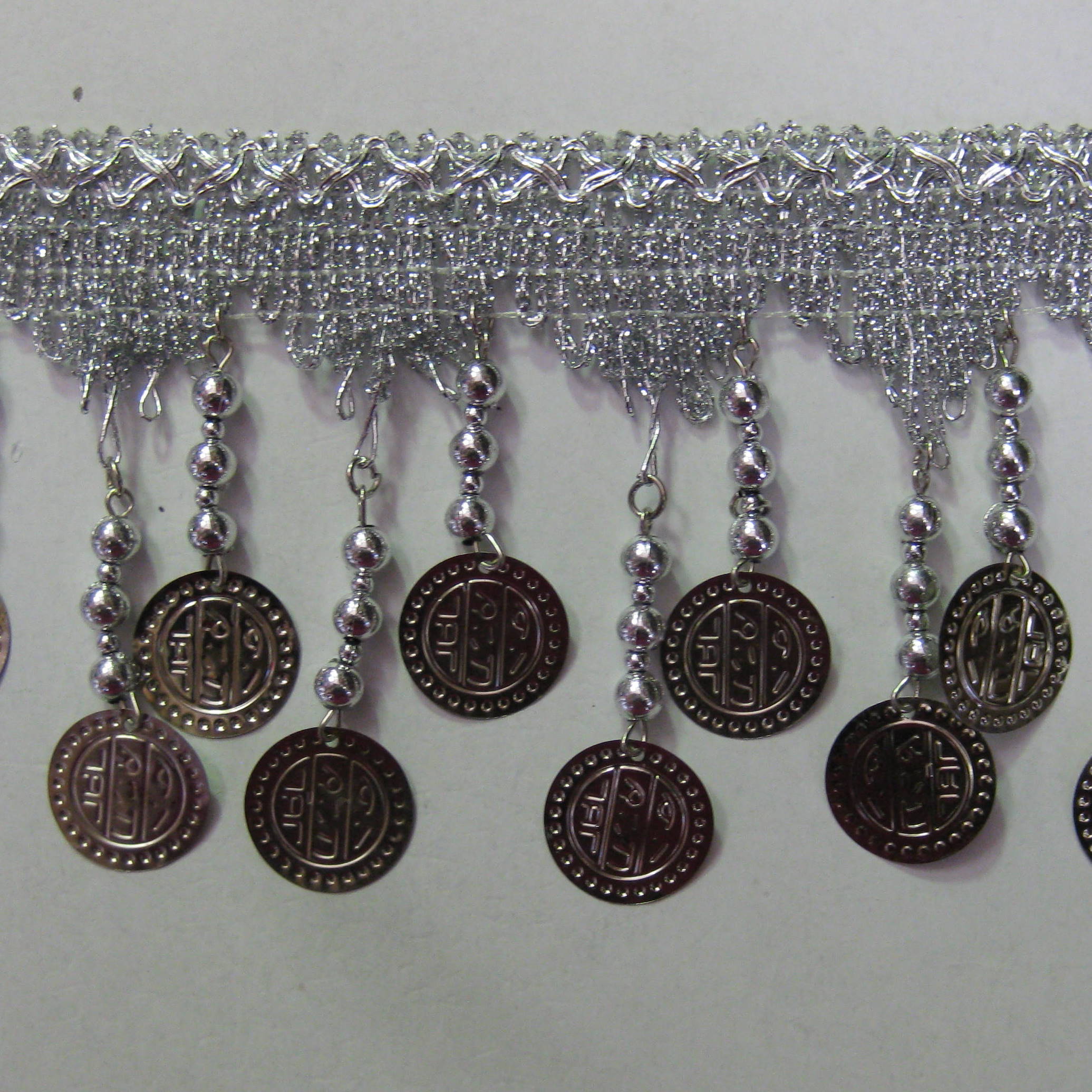 COIN FRINGE COIN FRINGE